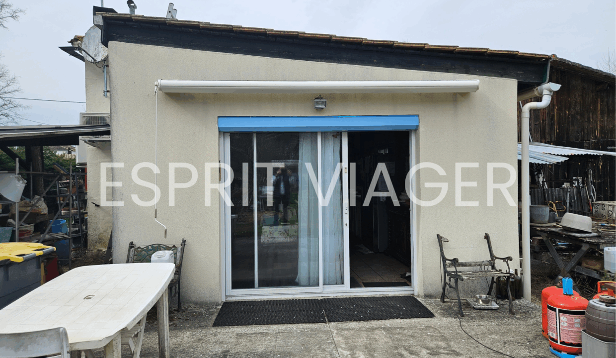 Esprit Viager VENDRE SON BIEN EN VIAGER BORDEAUX VUE BAIE VITREE ET SALLE A MANGER